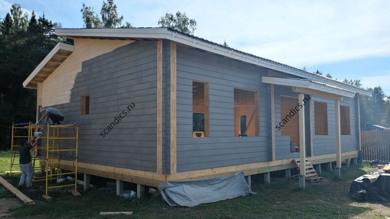 Покраска дома из  клеёного бруса
